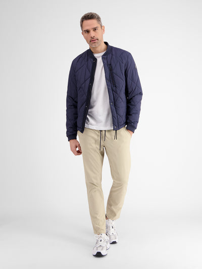 Lightweight hyper-stretch chinos with quick-dry functionality