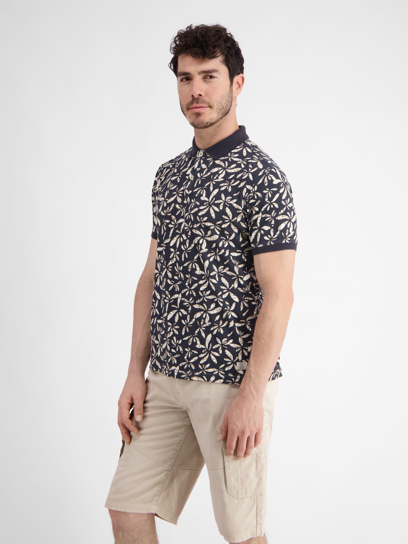 Men's polo shirt with floral all-over print
