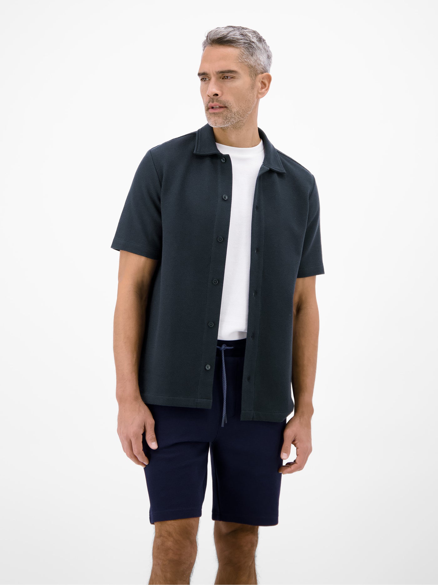 Poloshirt mit durchgehender Knopfleiste, unifarben - Polo Shirt Kurzarm