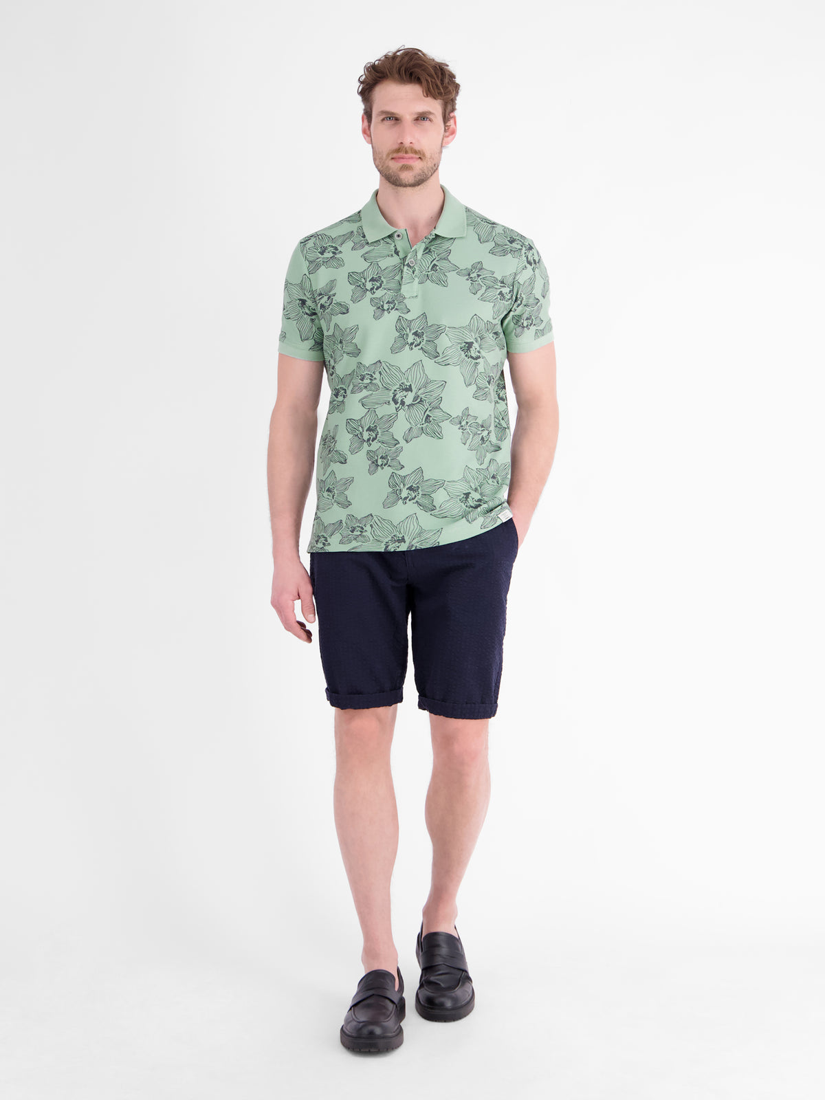 Poloshirt mit floralem Allover-Print und Flachstrickkragen - Polo Shirt Kurzarm