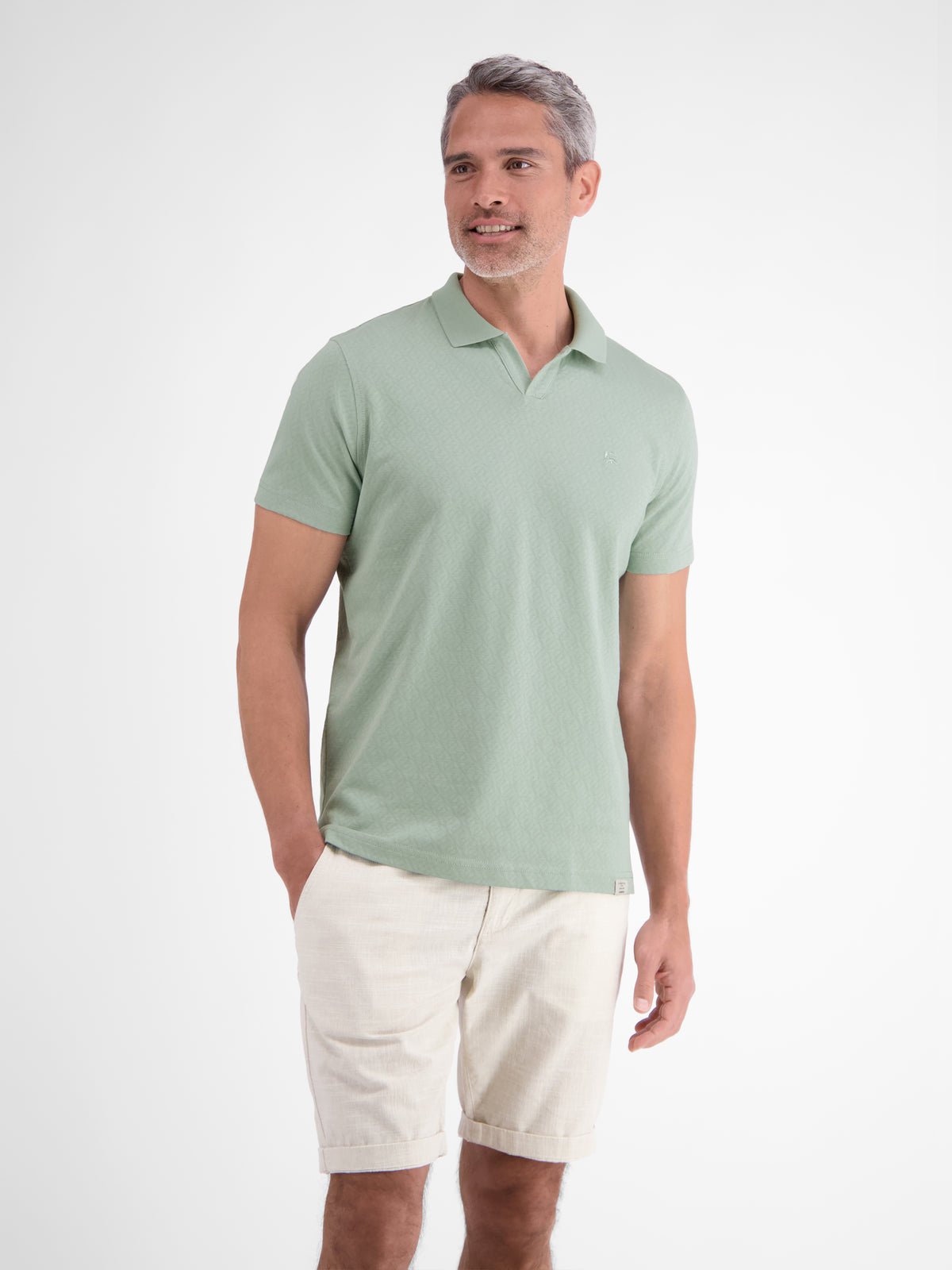 Modernes Poloshirt mit Jaquard-Muster und knopflosem Kragen - Polo Shirt Kurzarm