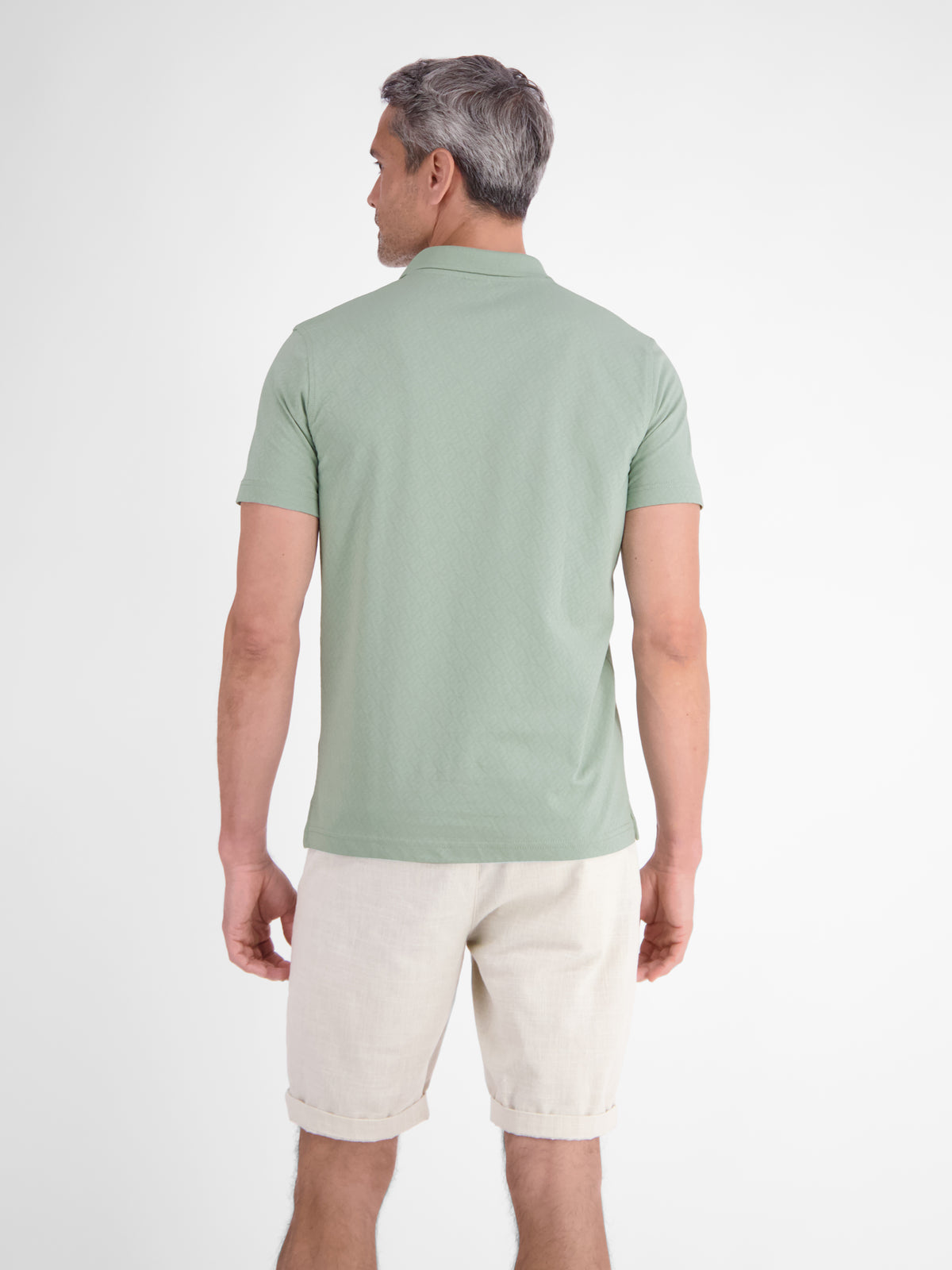 Modernes Poloshirt mit Jaquard-Muster und knopflosem Kragen - Polo Shirt Kurzarm