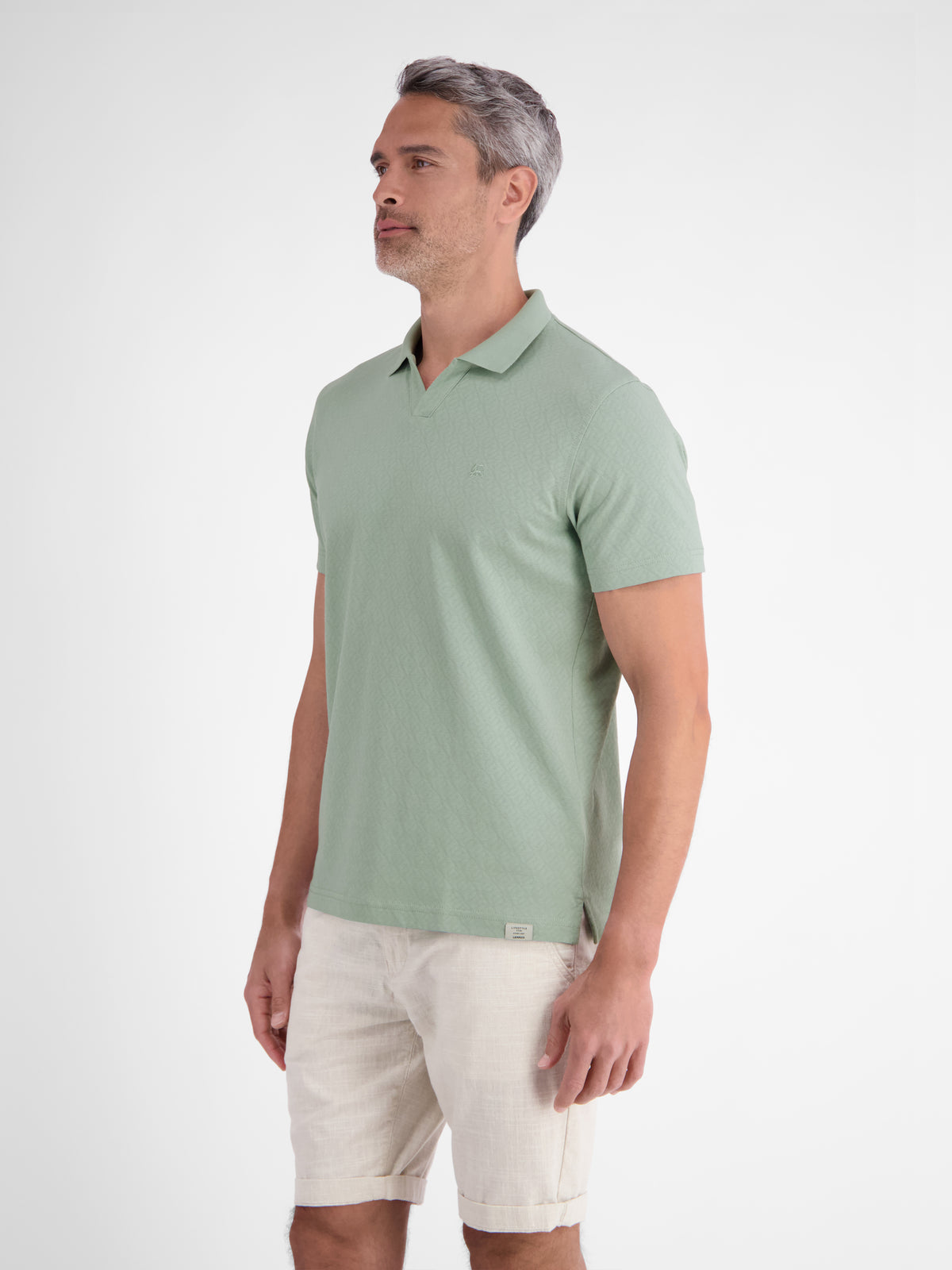 Modernes Poloshirt mit Jaquard-Muster und knopflosem Kragen - Polo Shirt Kurzarm