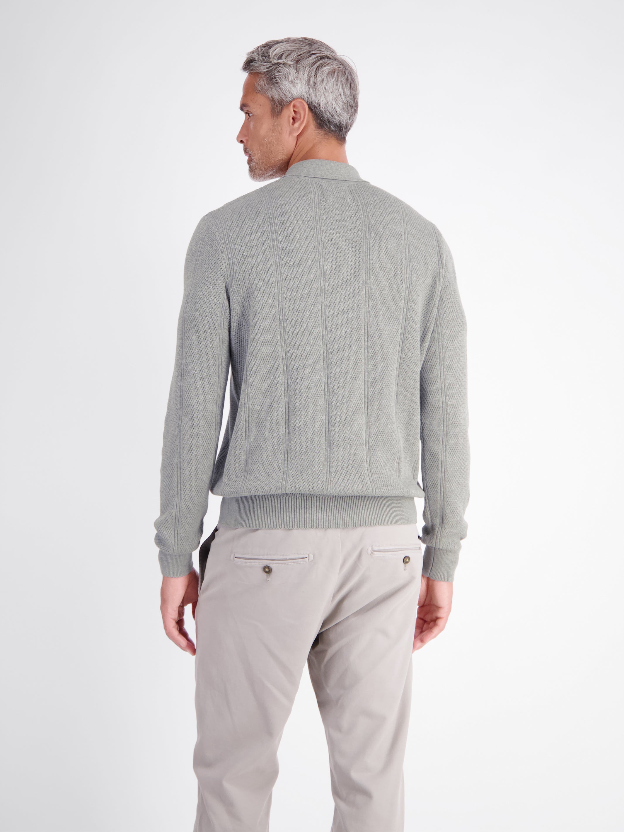 Elegant long-sleeve polo shirt with refined vertical stripes