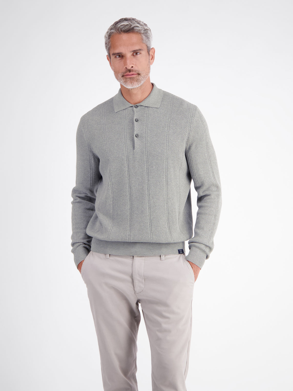 Elegant long-sleeve polo shirt with refined vertical stripes