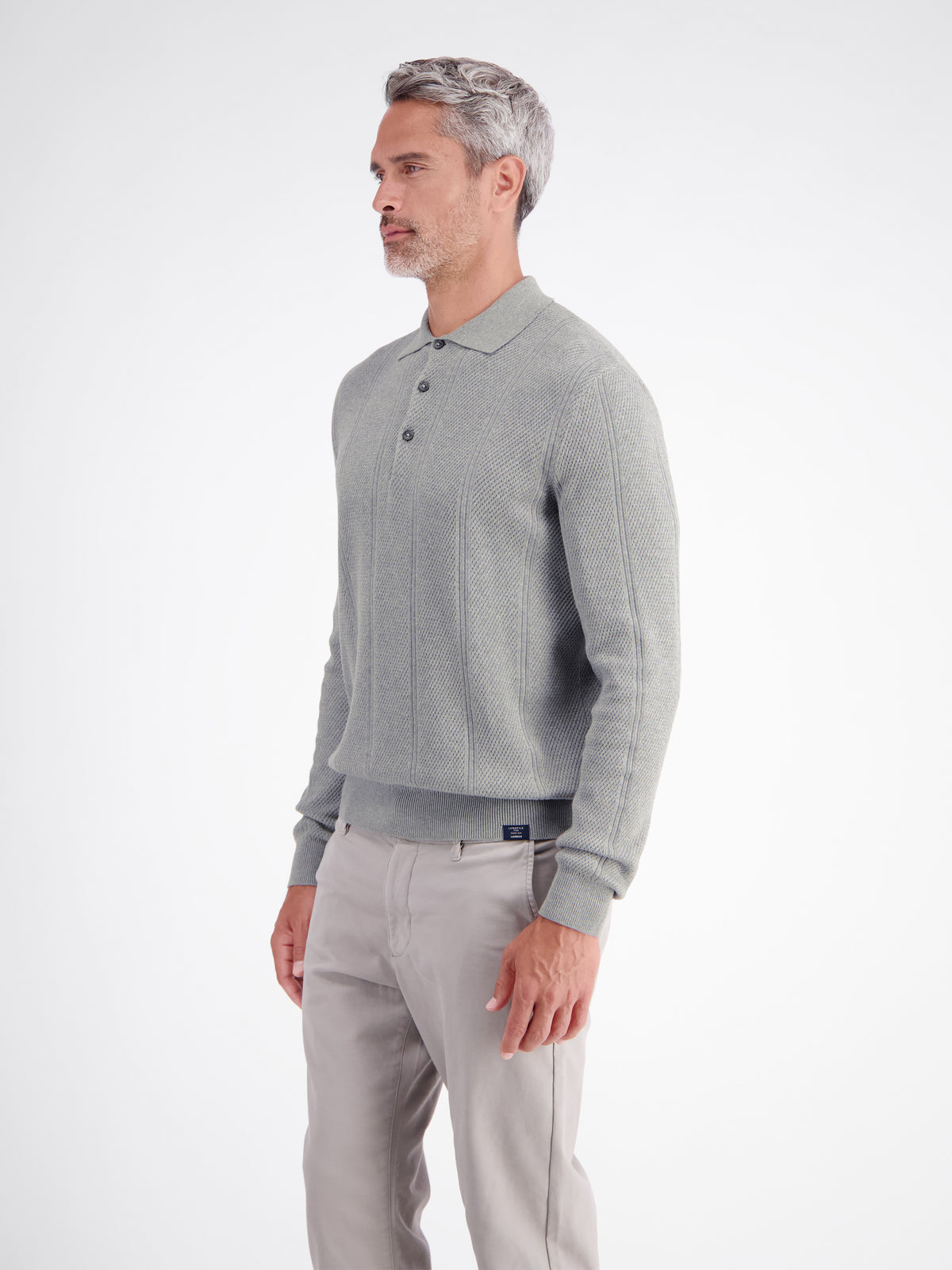 Elegant long-sleeve polo shirt with refined vertical stripes