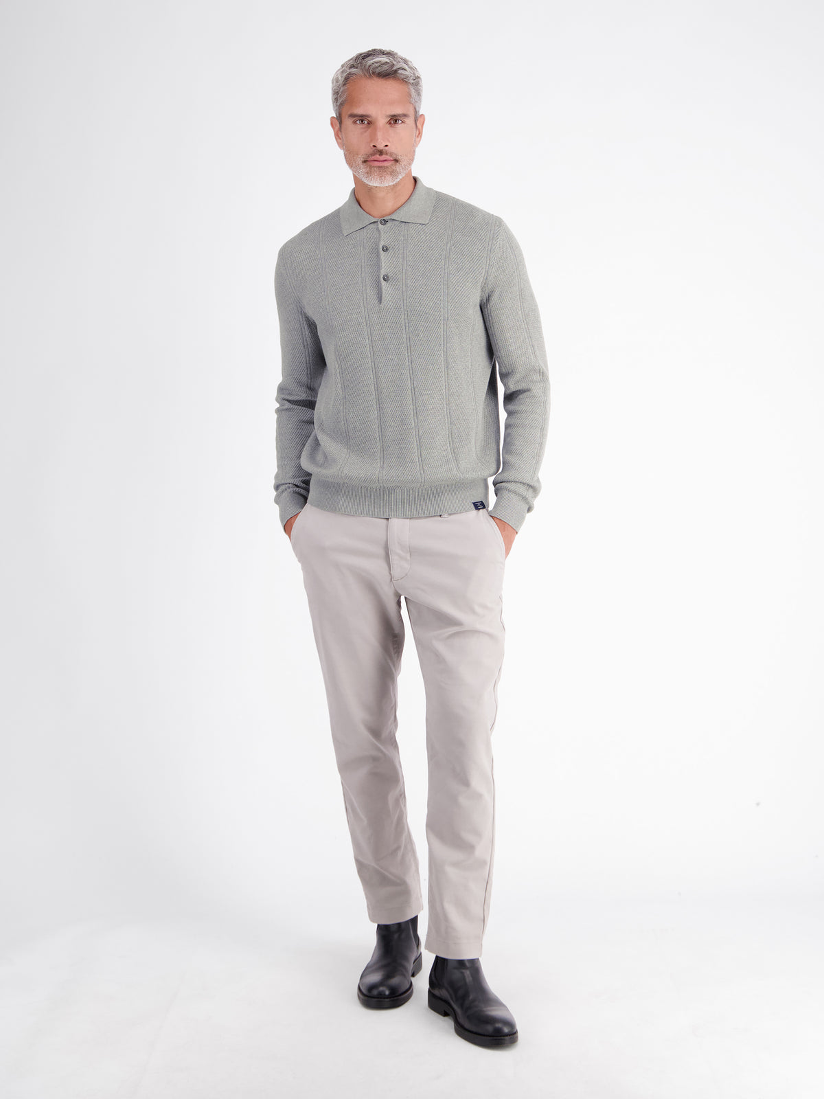 Elegant long-sleeve polo shirt with refined vertical stripes
