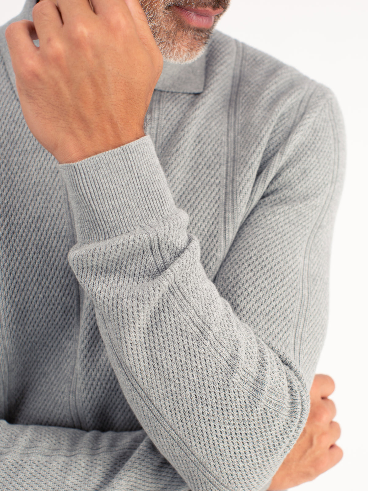 Elegant long-sleeve polo shirt with refined vertical stripes