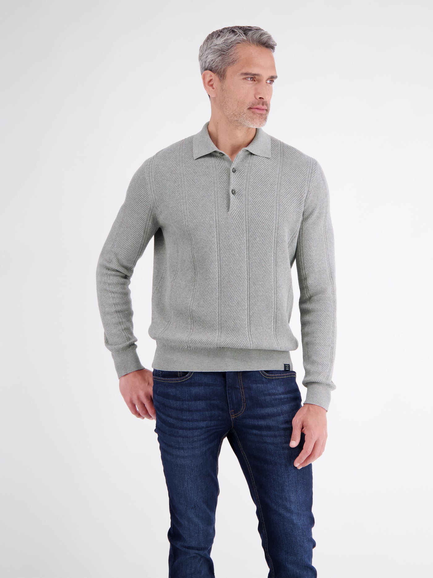 Elegant long-sleeve polo shirt with refined vertical stripes
