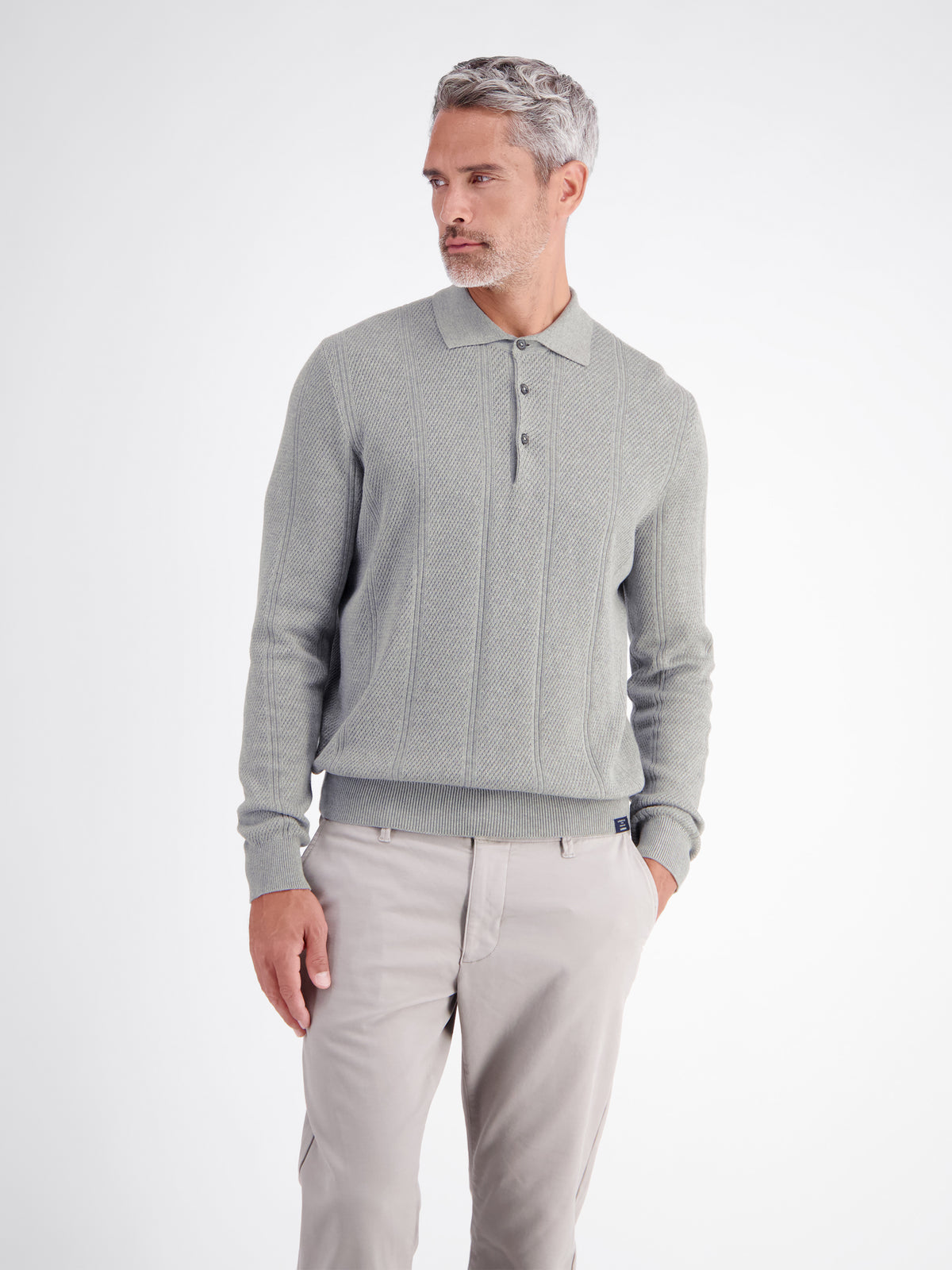 Elegant long-sleeve polo shirt with refined vertical stripes