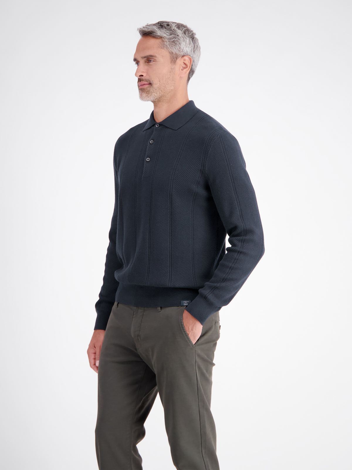 Elegant long-sleeve polo shirt with refined vertical stripes