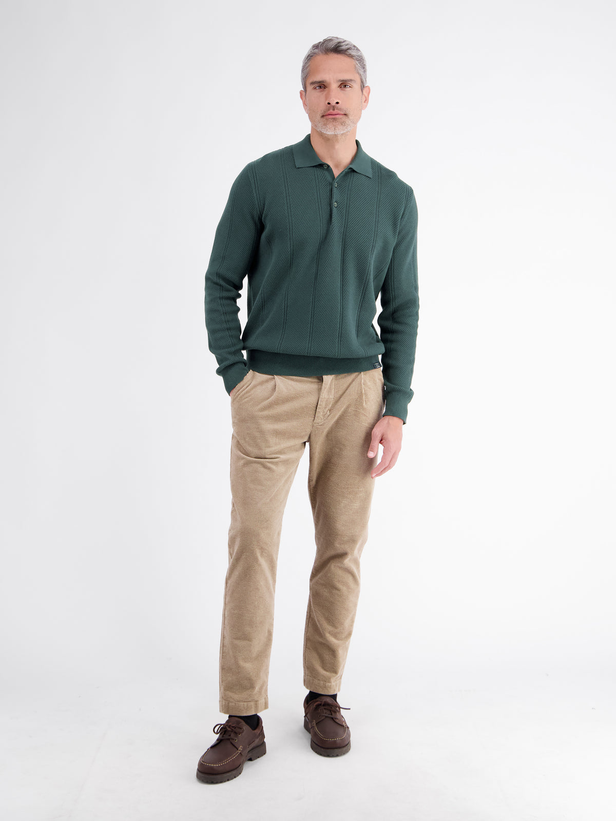Elegant long-sleeve polo shirt with refined vertical stripes