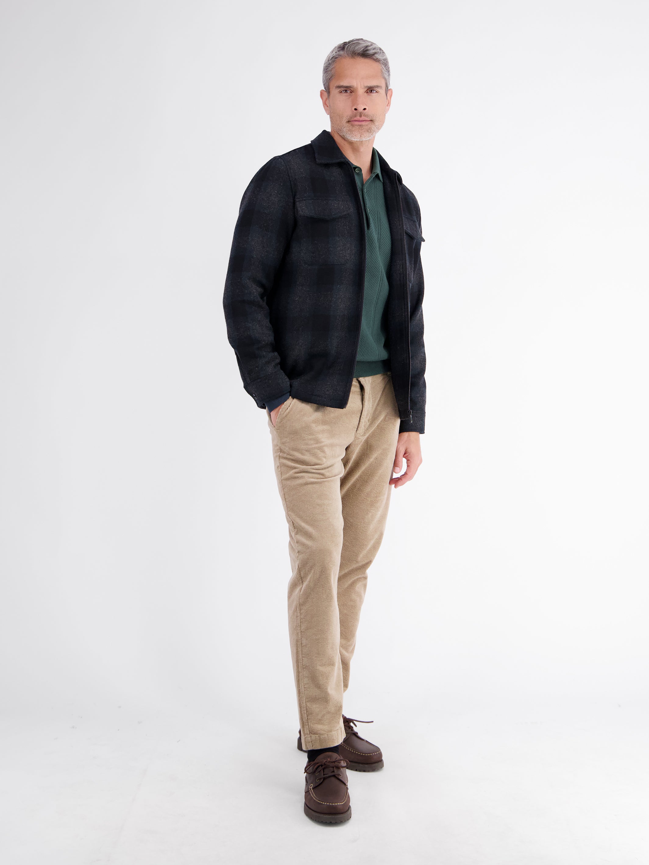 Elegant long-sleeve polo shirt with refined vertical stripes