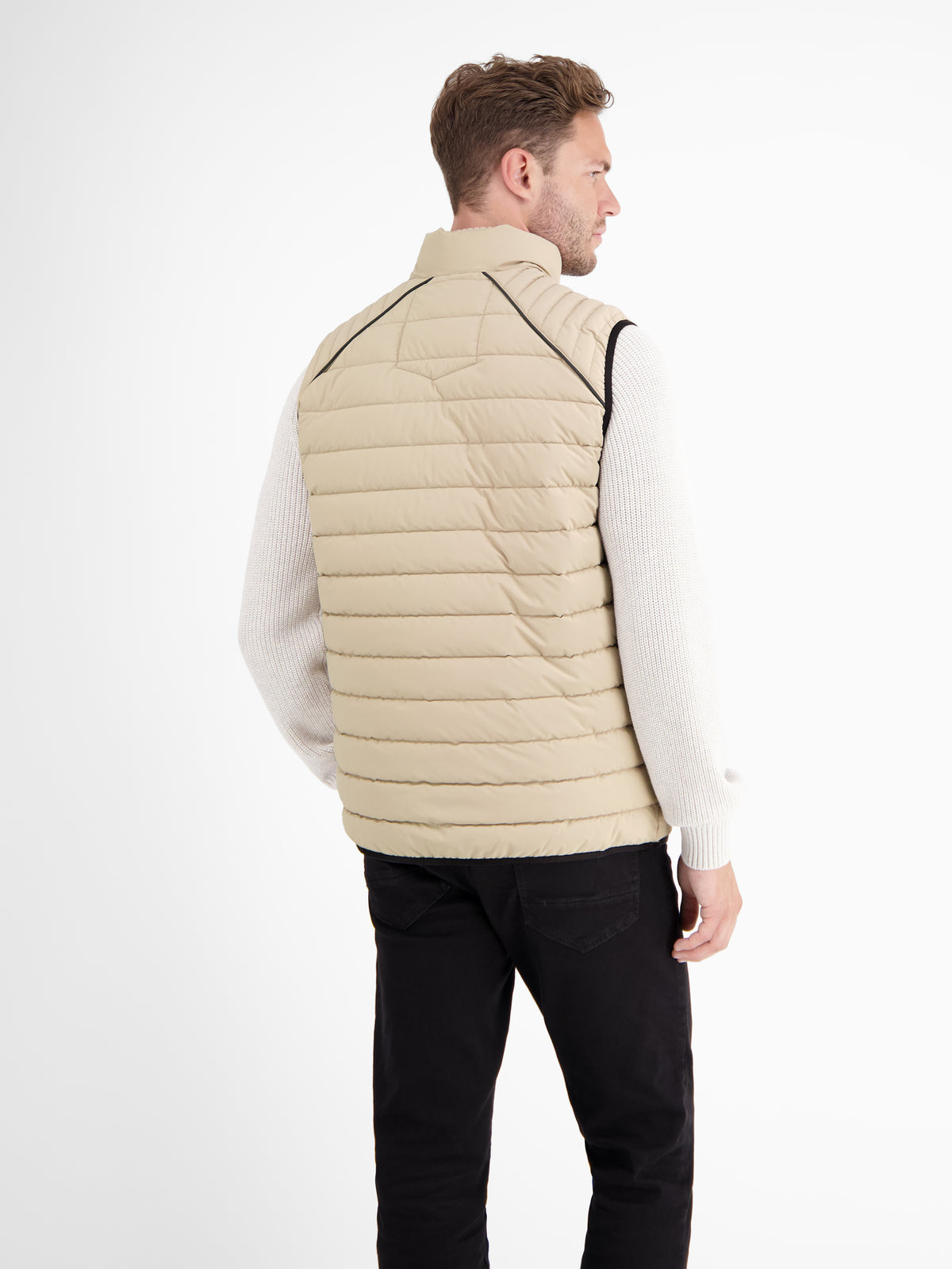 Sporty quilted vest with a high collar and zip pockets