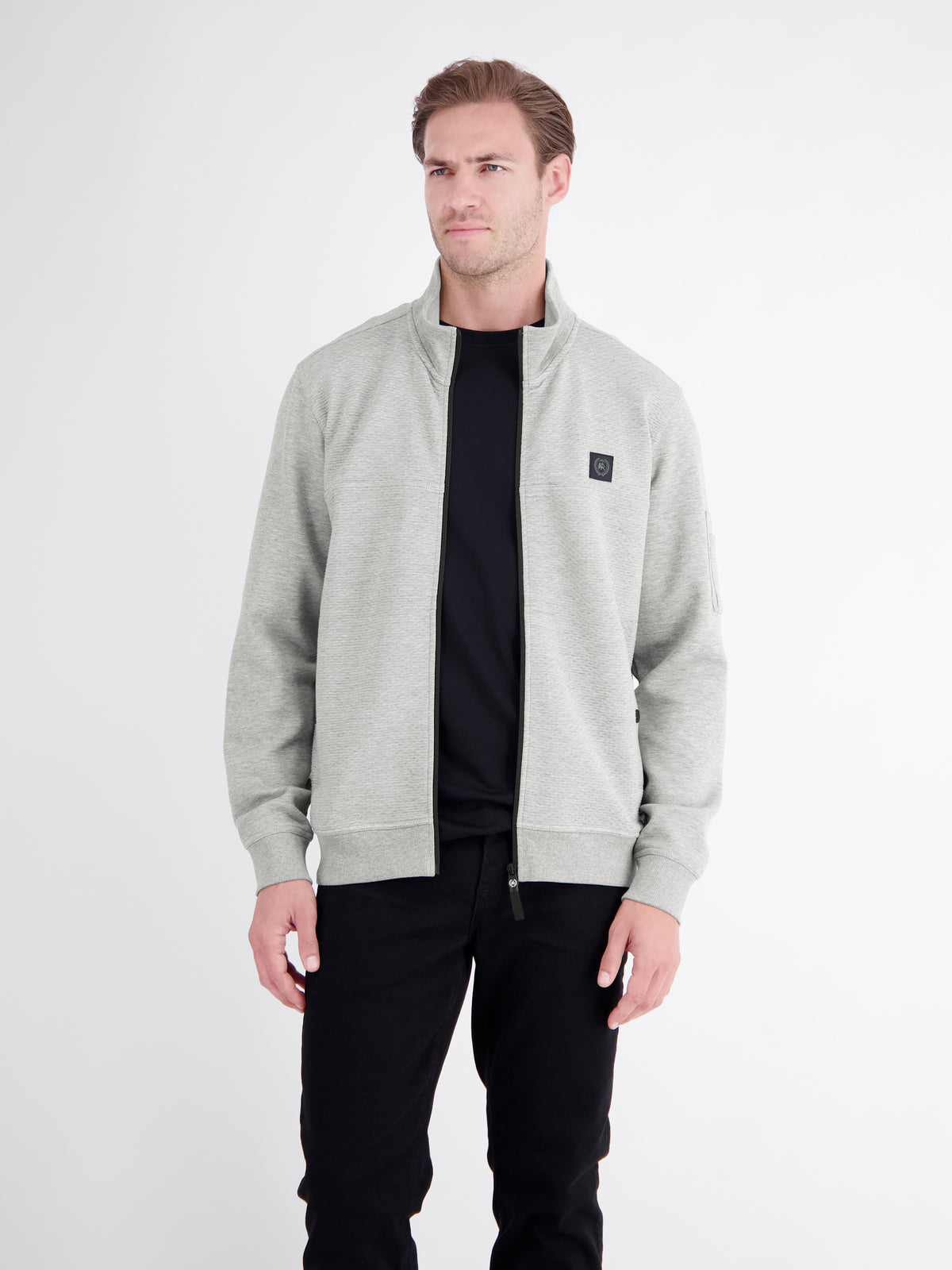 Sweatjacke mit Stehkragen und Oberarmtasche