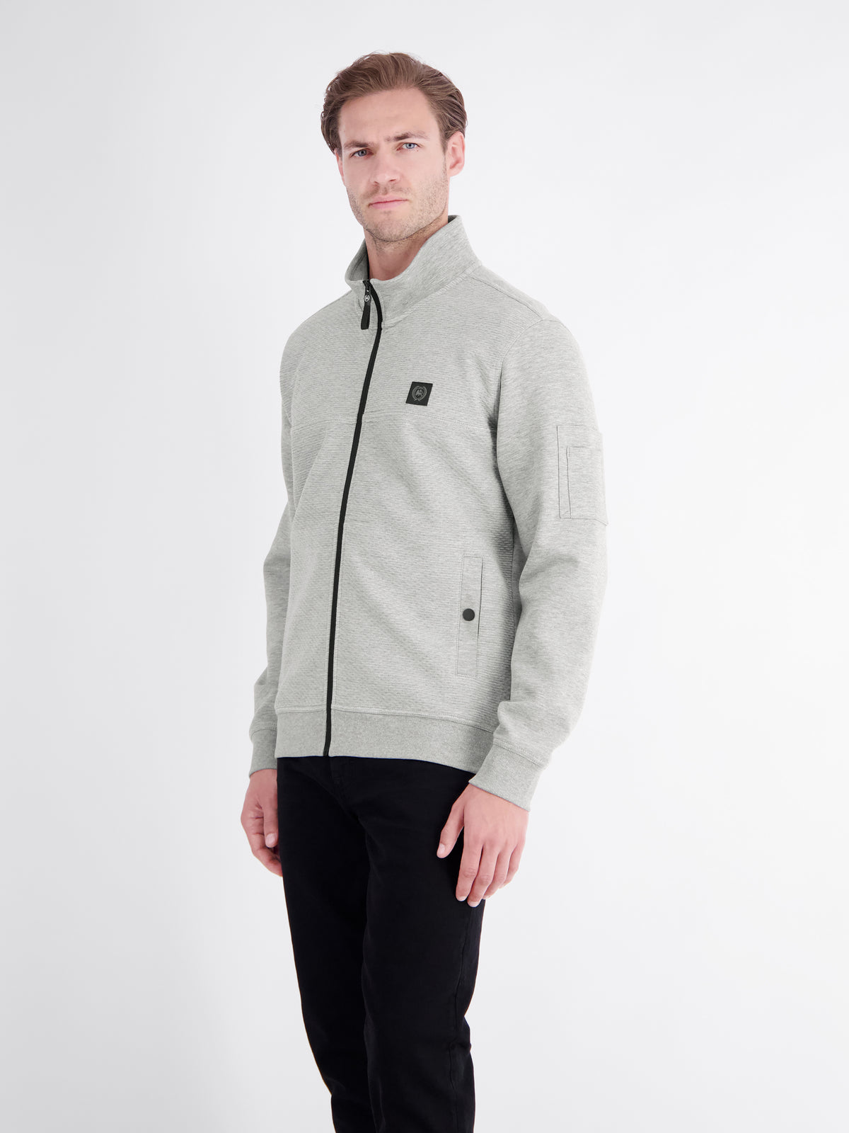 Sweatjacke mit Stehkragen und Oberarmtasche
