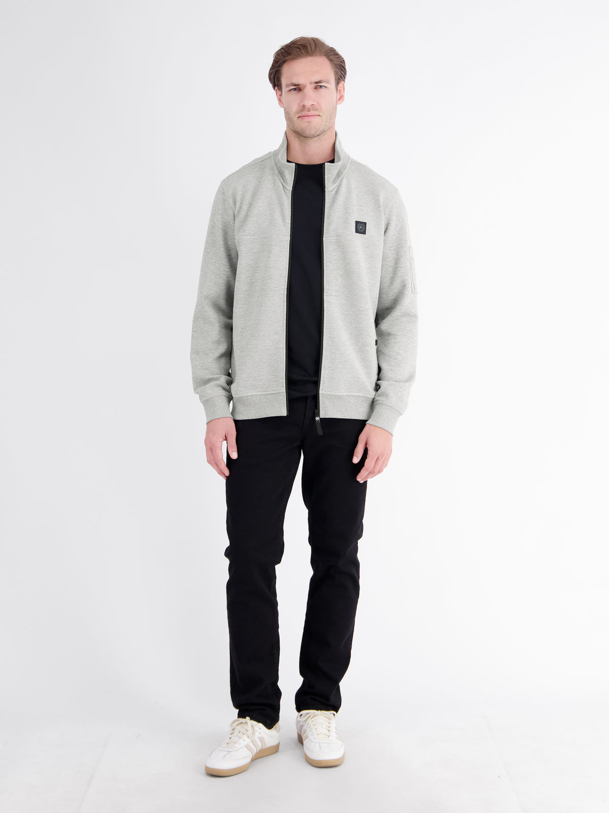 Sweatjacke mit Stehkragen und Oberarmtasche