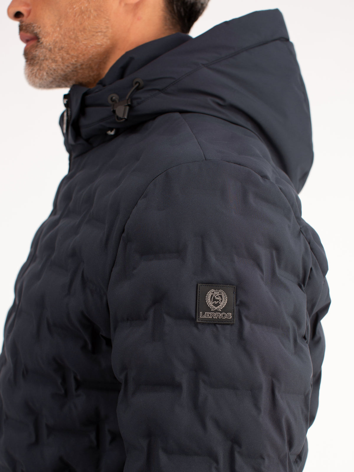 Warm quilted functional jacket with detachable hood