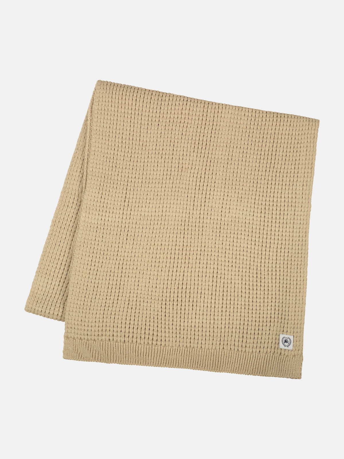 Knitted scarf made of warming synthetic fiber with a flexible structure