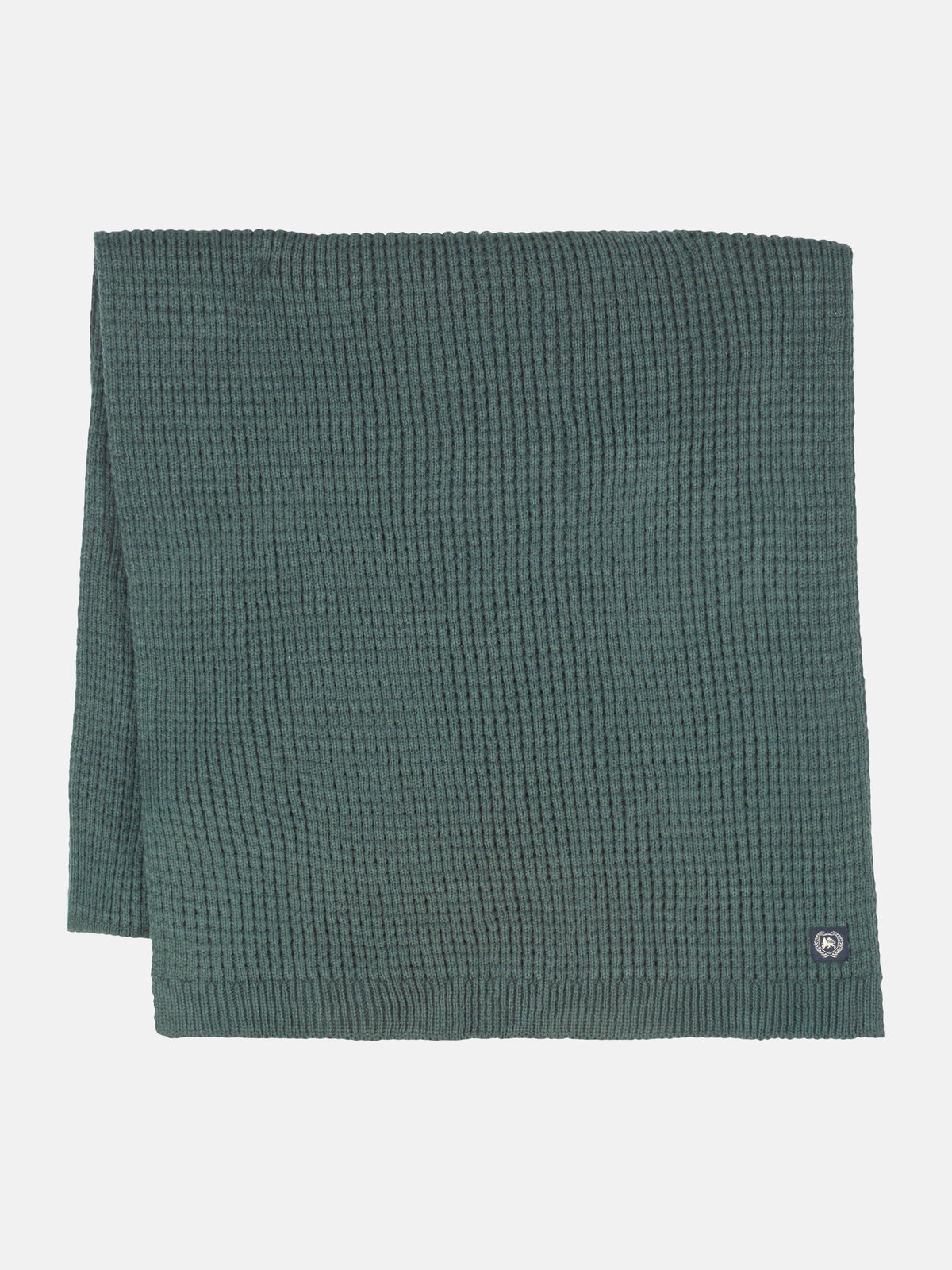 Knitted scarf made of warming synthetic fiber with a flexible structure